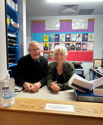 Front of house volunteers smile for the camera in our box office